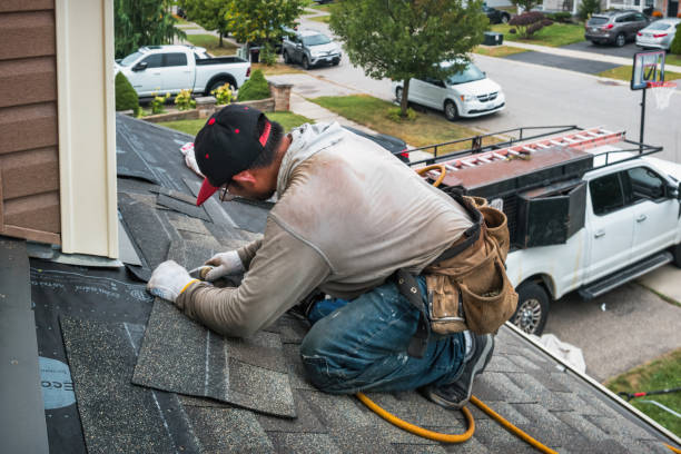 Professional Roofing technician working in Hastings, NY